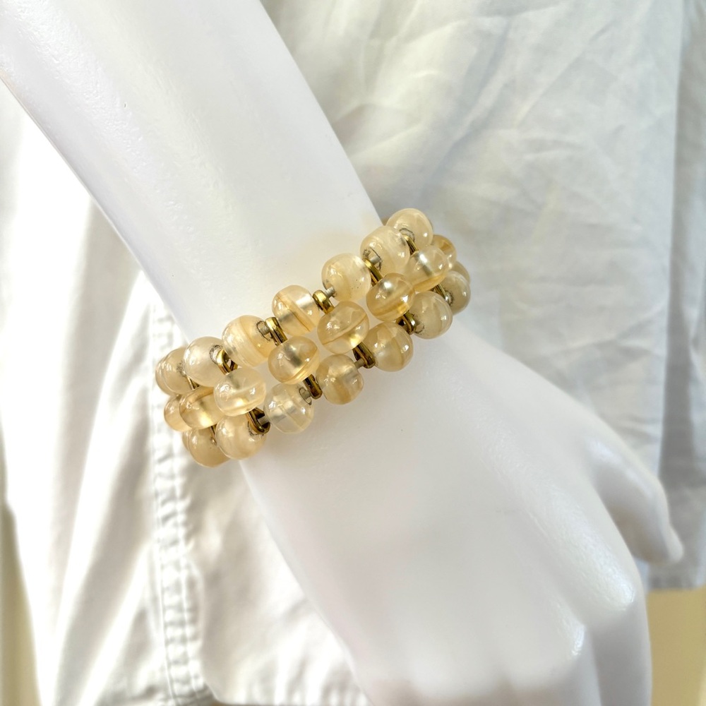 cream marbled glass round beads 3 rows stretchy bracelet with gold tone spacers